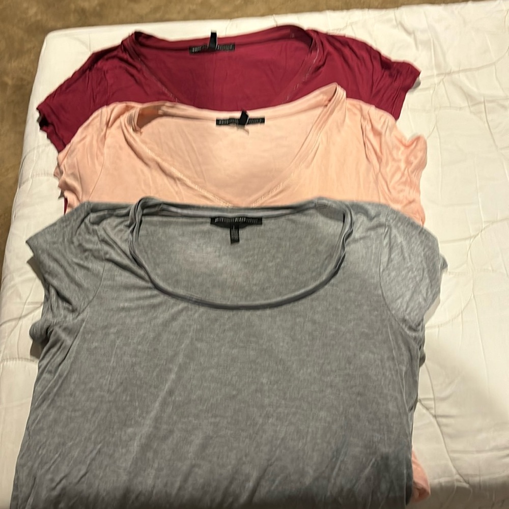 White House Black Market. 3 size large T-shirts 1 pink, 1 dark pink, 1 gray GUC